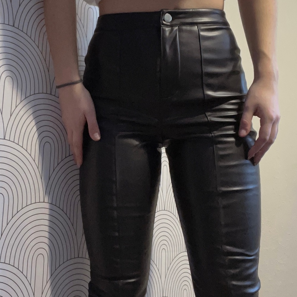 Faux leather split-hem pants